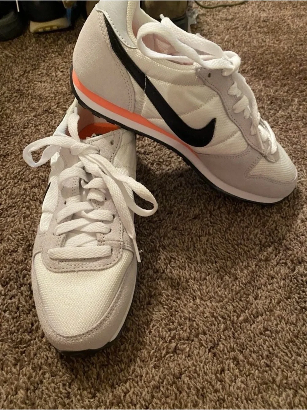 Nike Women’s White & Black Sneakers with Coral Accent
